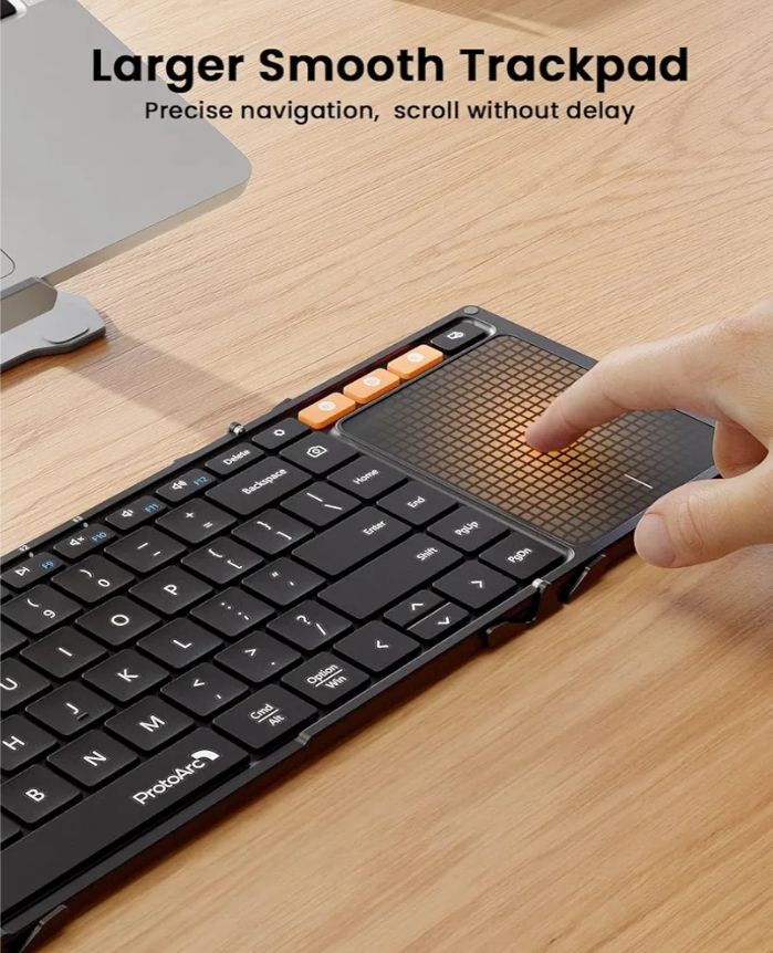 Teclado plegable con panel táctil