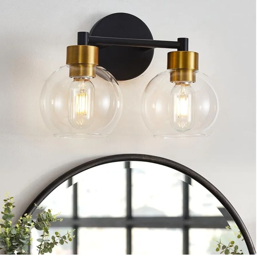 Lámparas de baño negras y doradas