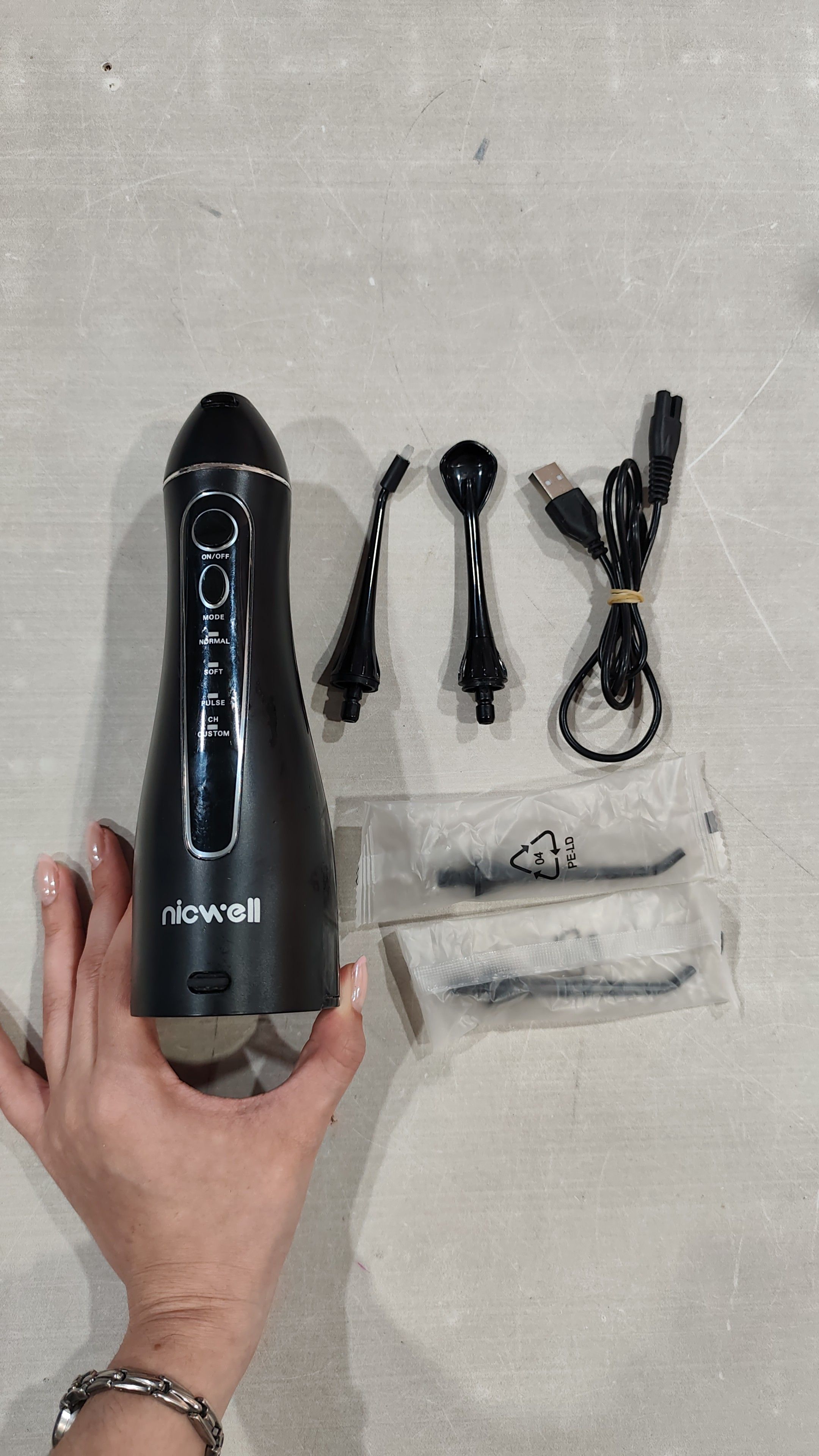 Nicwell - Irrigador dental inalámbrico con puntas para hilo dental