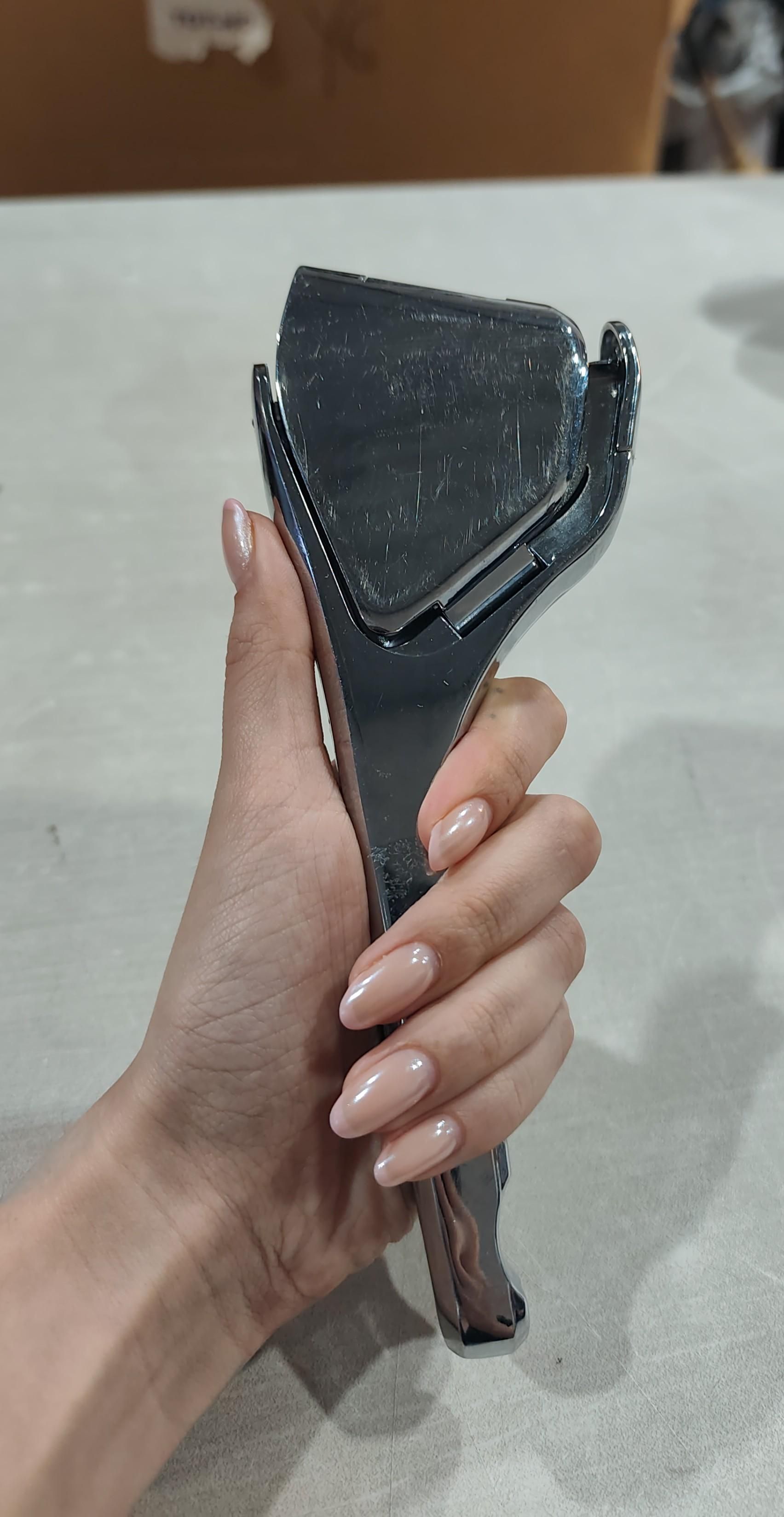 Exprimidor manual de mano